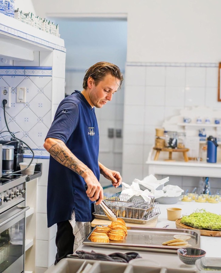 Chef cooking in a villa kitchen